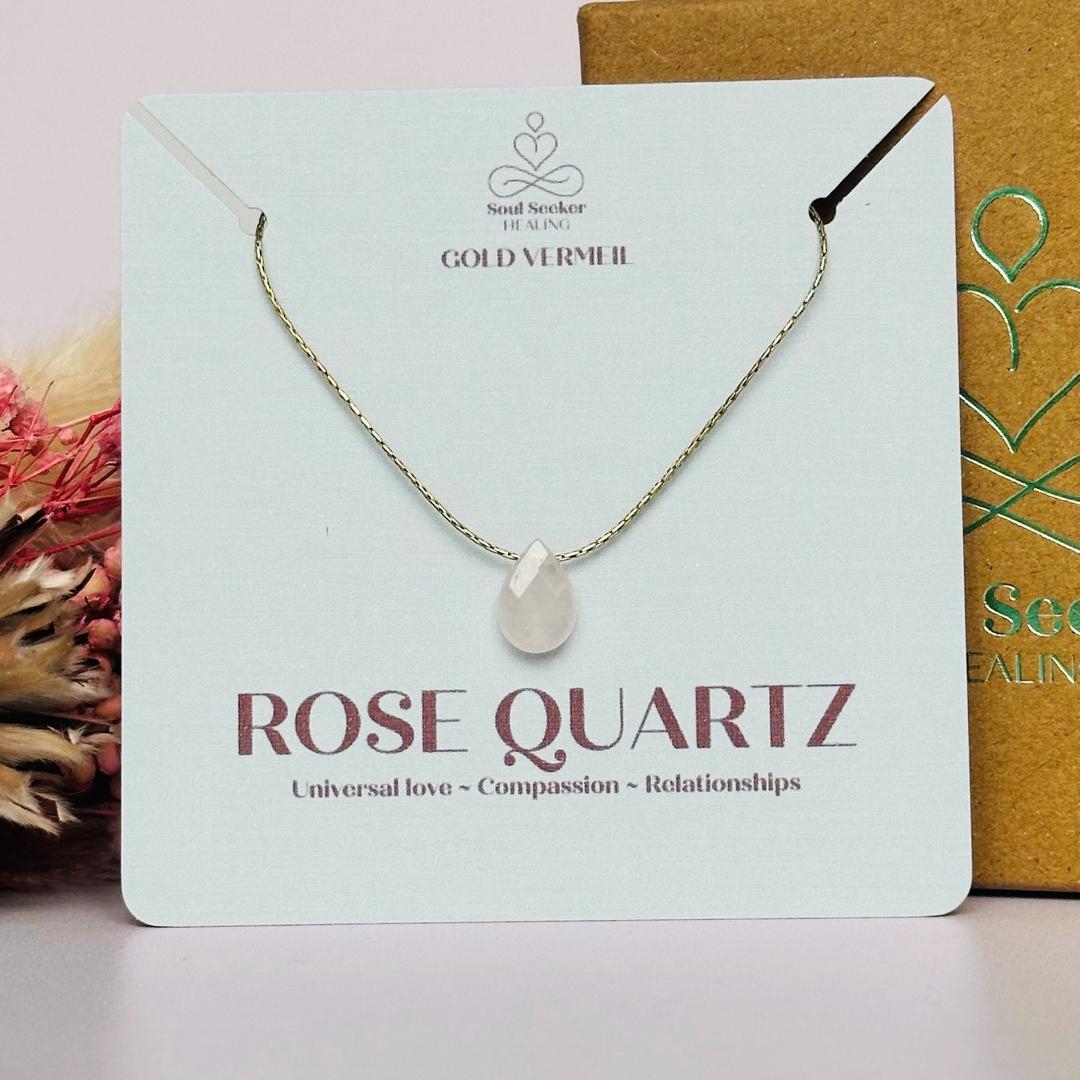 Dainty rose quartz teardrop necklace featuring a 12x8mm faceted rise quartz teardrop bead on a fine gold vermeil beading chain.