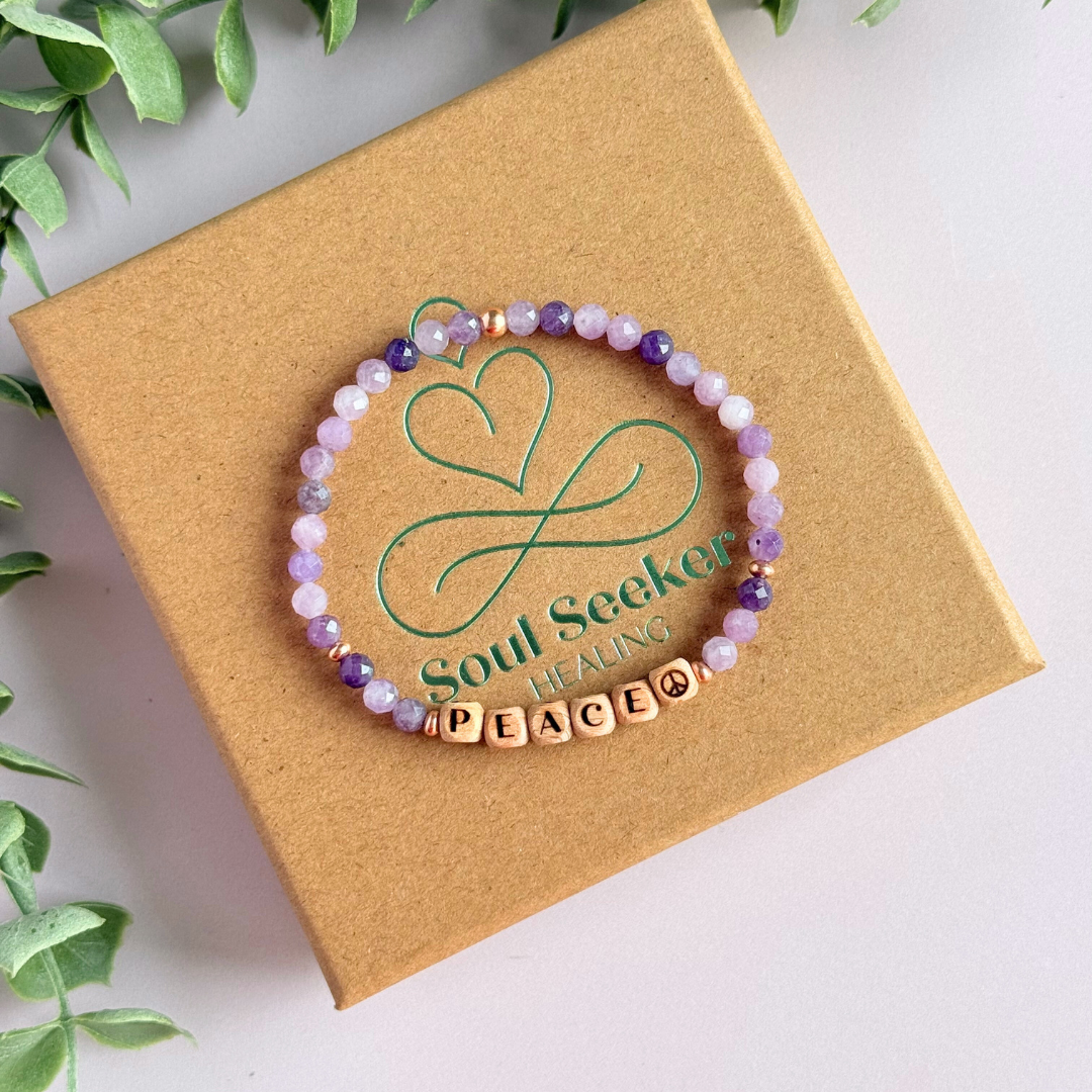 Bracelet featuring 5mm engraved wooden beads which you can personalise with your choice of words, numbers and symbols. The main the band of the bracelet is made with 4mm faceted lepidolite round crystal gemstone beads. Finished with your choice of gold vermeil, sterling silver or rose gold vermeil accent beads.