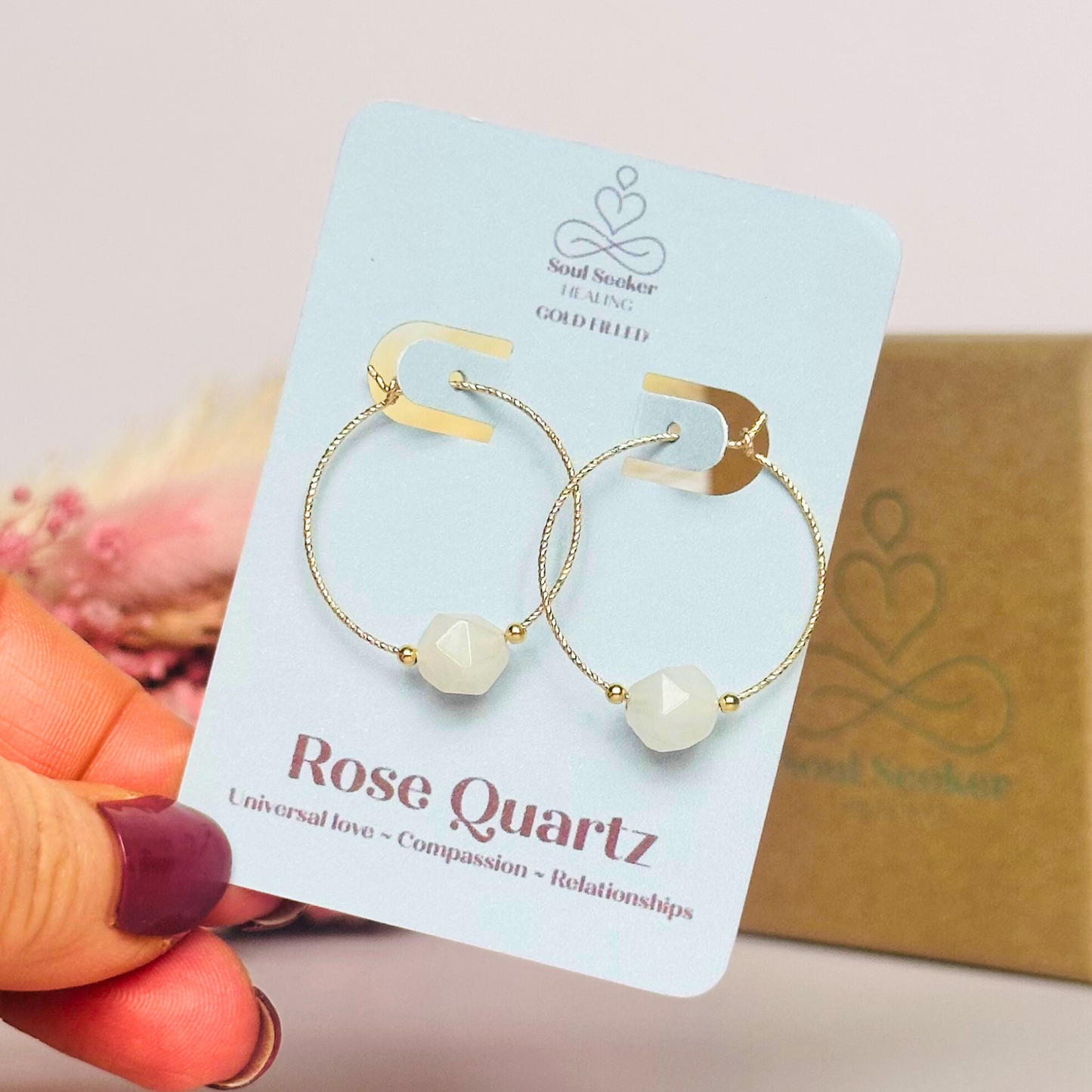 Rose Quartz gold filled hoop earrings featuring 8mm star cut rose quartz beads on 25mm sparkle cut gold filled hoops.