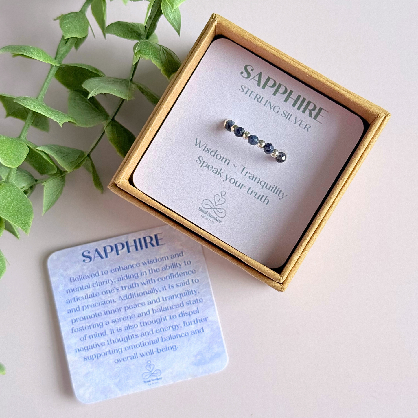 Sterling silver and sapphire crystal ring. Made with 2.5 mm sterling silver round beads and featuring five, 3mm faceted genuine sapphire beads in a band style. Perfect for stacking. September birthstone jewellery