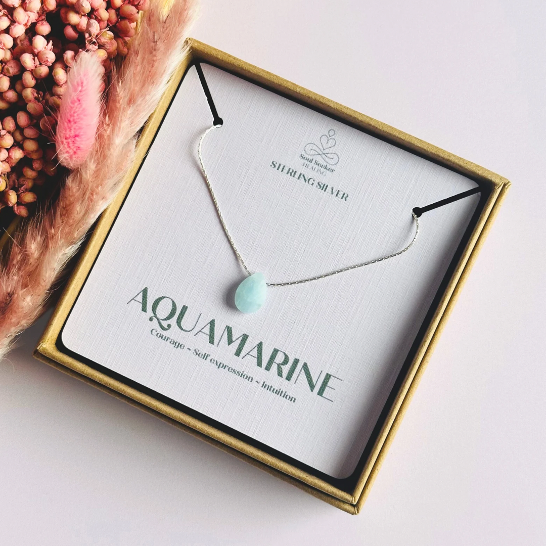 Dainty aquamarine teardrop necklace featuring a 12x8mm faceted aquamarine teardrop bead on a fine sterling silver cardano beading chain.