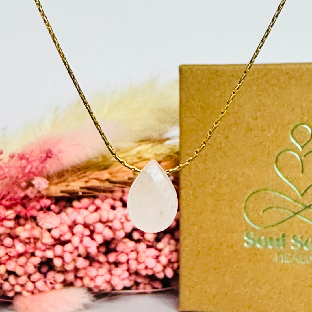 Dainty rose quartz teardrop necklace featuring a 12x8mm faceted rise quartz teardrop bead on a fine gold vermeil beading chain.
