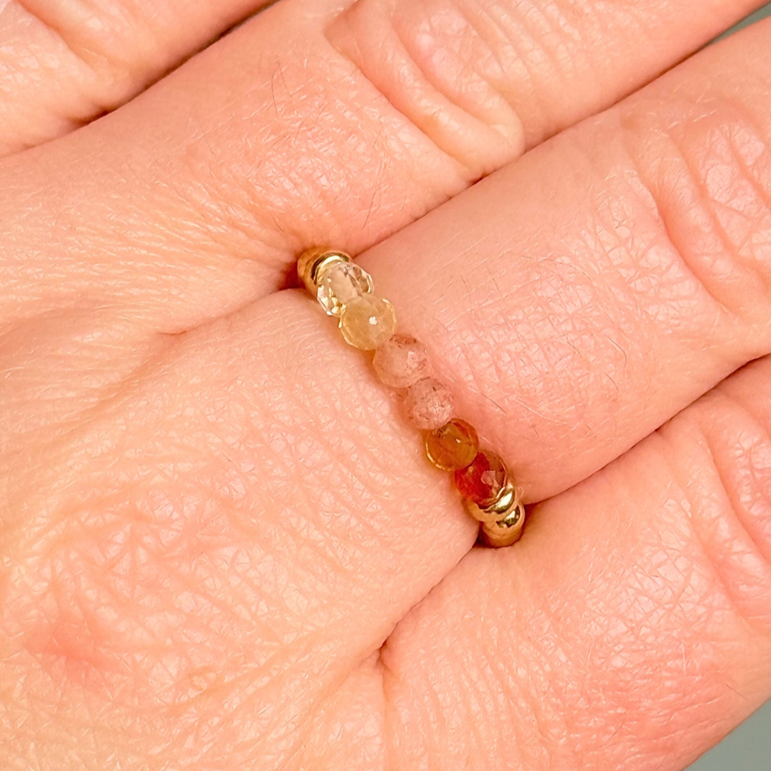 Gold vermeil band style ombré ring with multicolour gradient 3mm faceted citrine, sunstone and carnelian beads with a beaded band of 2.5 mm gold vermeil round beads. Elasticated for comfort.