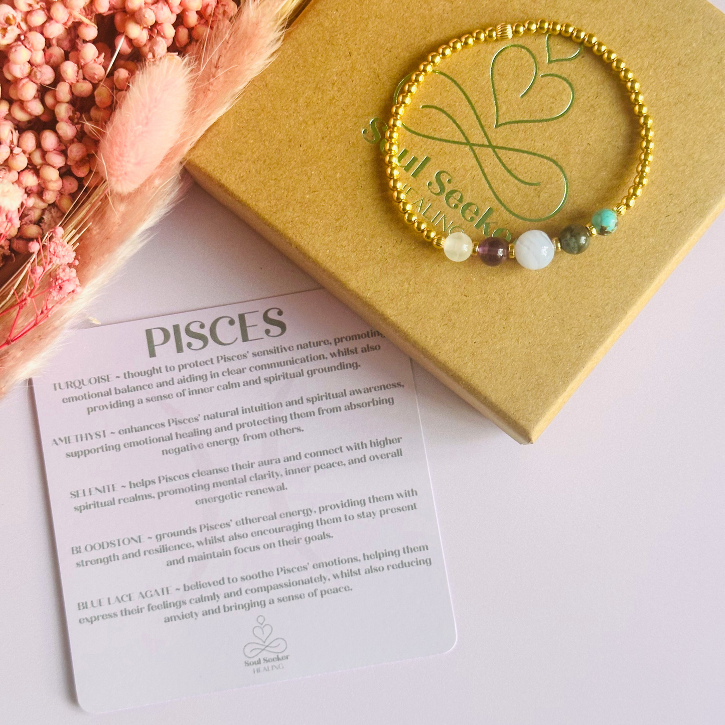 This gold vermeil Pisces bracelet is made with a selection of five healing crystals all believed to resonate with the Pisces zodiac sign. The central bead is 8mm, the other four are 6mm. On an elasticated band of 3mm gold vermeil beads with corrugated accent beads. Featuring turquoise, bloodstone, blue lace agate, amethyst and selenite.