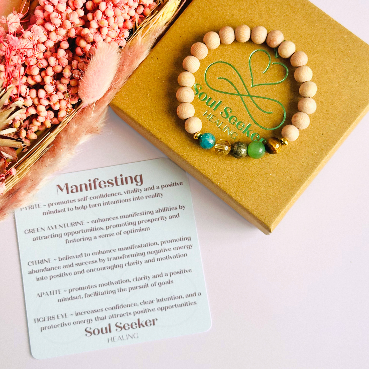Essential oil diffuser bracelet with five crystals all believed to help with manifestation. Featuring raw rosewood beads to diffuse aromatherapy oils. With apatite, citrine, pyrite, green aventurine and tigers eye. All beads are 8 mm.