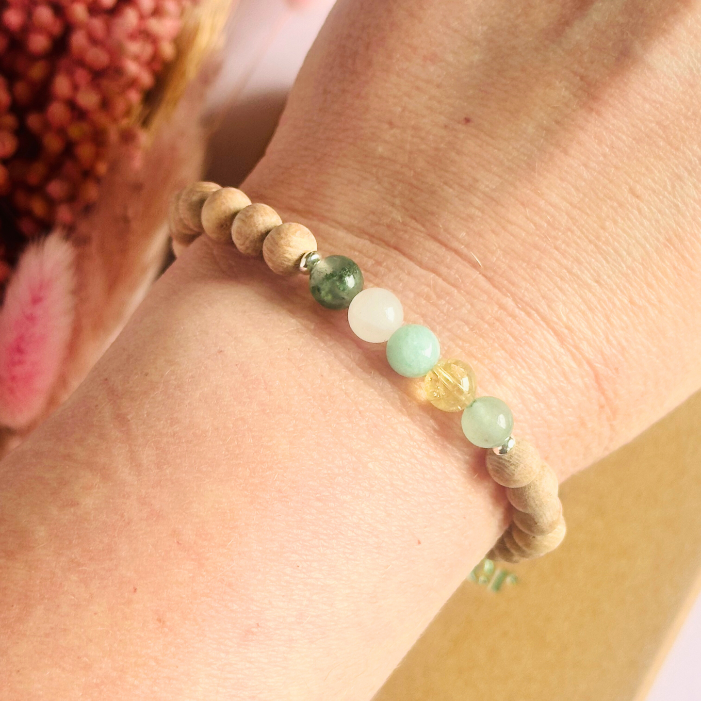 Spring crystal raw rosewood essential oil diffuser bracelet with moss agate, rose quartz, citrine, amazonite and green aventurine.