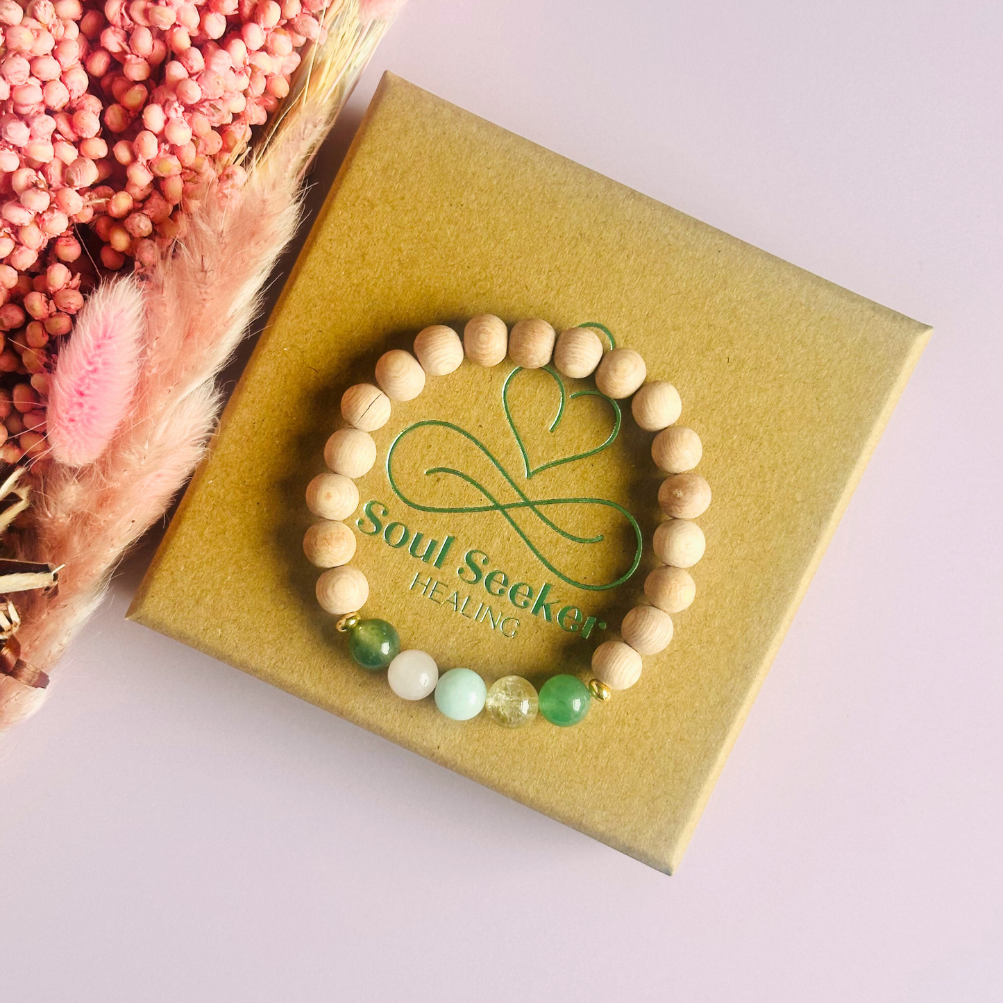 Spring crystal raw rosewood essential oil diffuser bracelet with moss agate, rose quartz, citrine, amazonite and green aventurine.