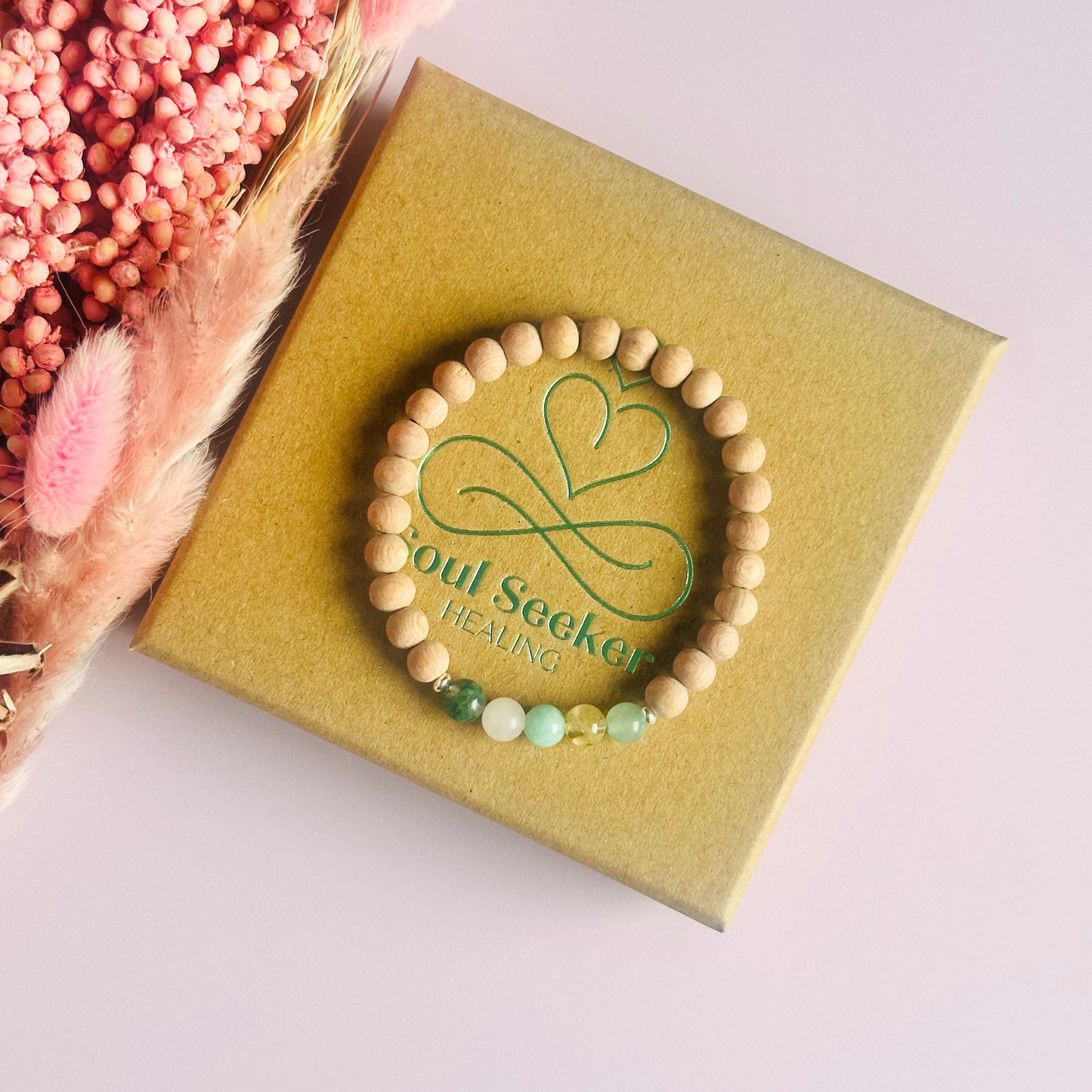 Spring crystal raw rosewood essential oil diffuser bracelet with moss agate, rose quartz, citrine, amazonite and green aventurine.