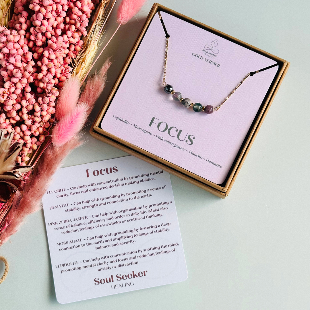 A dainty focus crystal necklace made with a selection of five healing crystals all believed to help you stay focused. On a fine, gold vermeil figaro chain, which fastens with a gold vermeil bolt clasp. Featuring corrugated gold vermeil spacer beads and accented with daisy shaped bead caps.