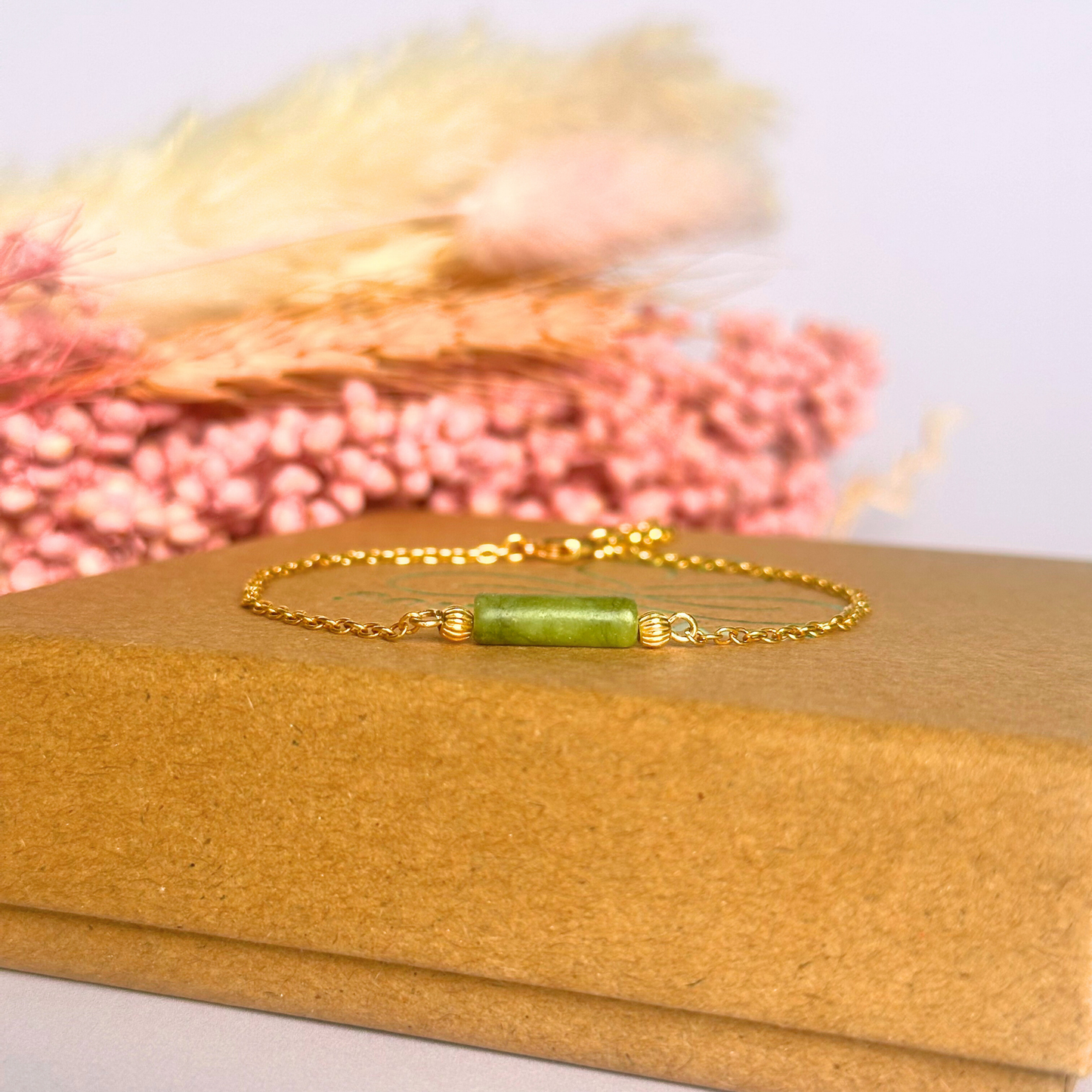 Dainty gold vermeil chain bracelet featuring a delicate green jade tube bead.