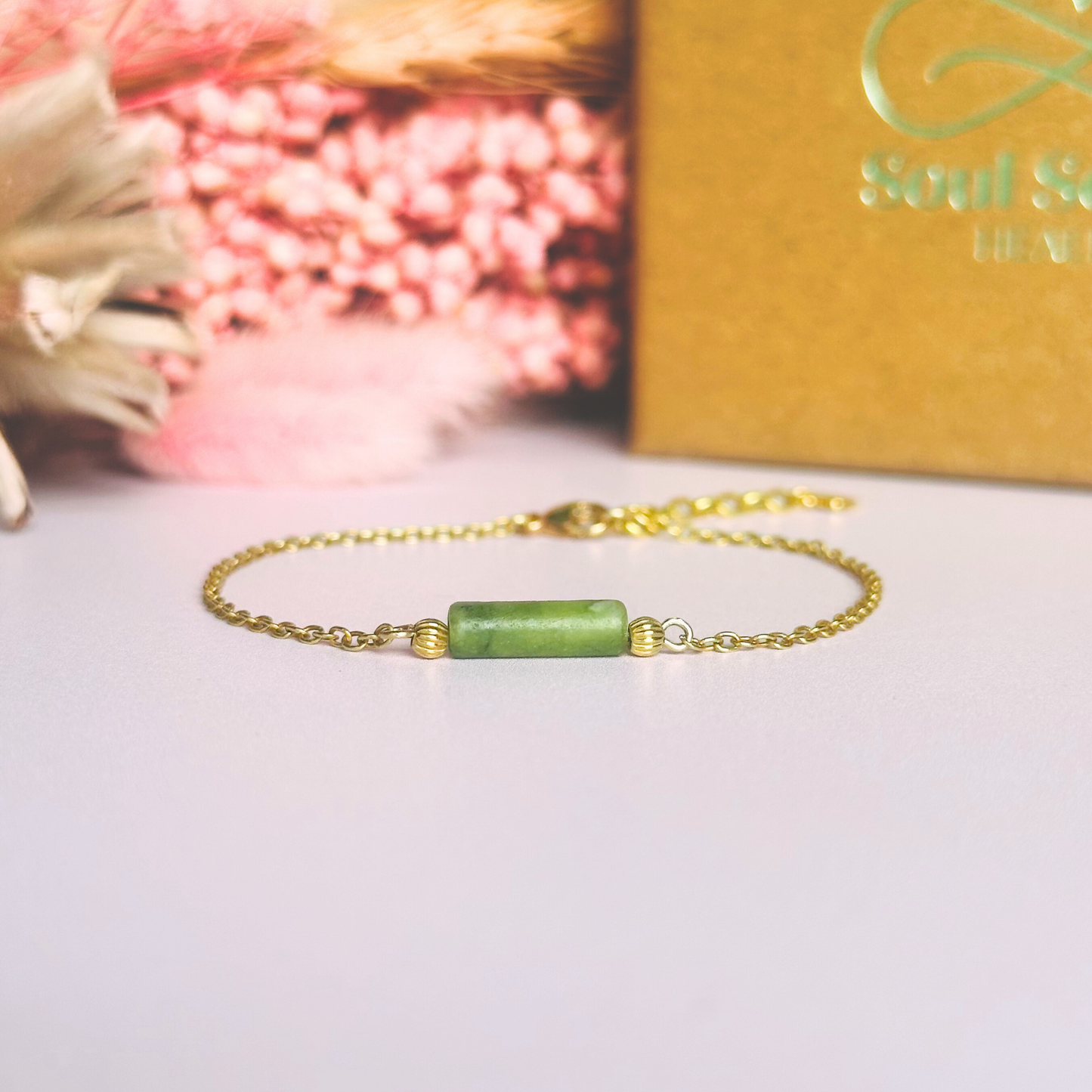 Dainty gold vermeil chain bracelet featuring a delicate green jade tube bead.