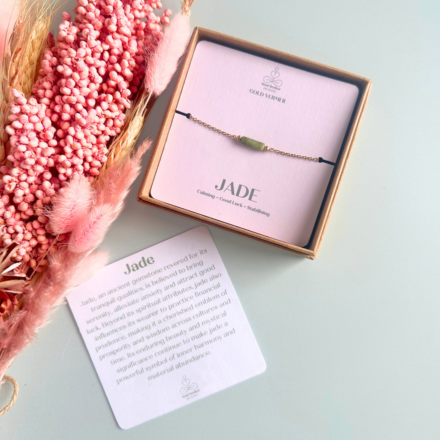 Dainty gold vermeil chain bracelet featuring a delicate green jade tube bead.