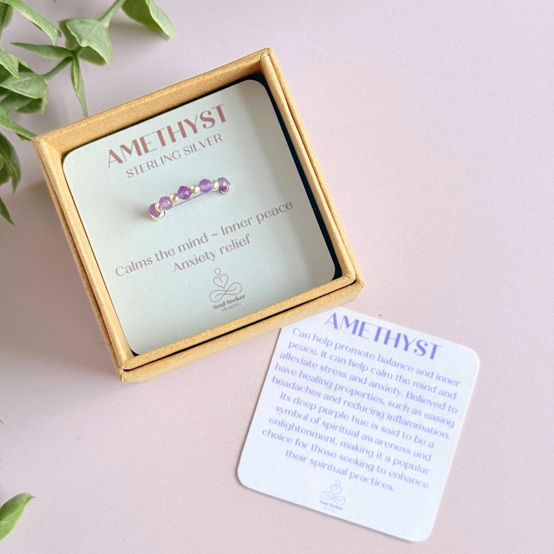 Sterling silver amethyst ring featuring five 3mm faceted round amethyst beads on a elasticated ring band of 2.5mm sterling silver beads. February birthstone ring.
