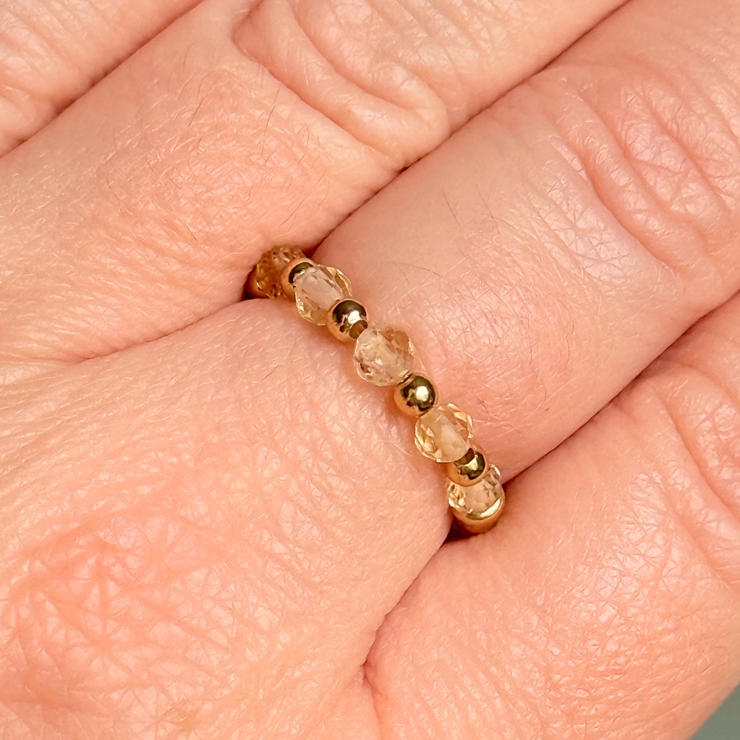 Gold vermeil and citrine crystal ring. Made with 2.5mm gold vermeil round beads and featuring five, 3mm faceted genuine citrine beads in a band style. Perfect for stacking. November birthstone jewellery