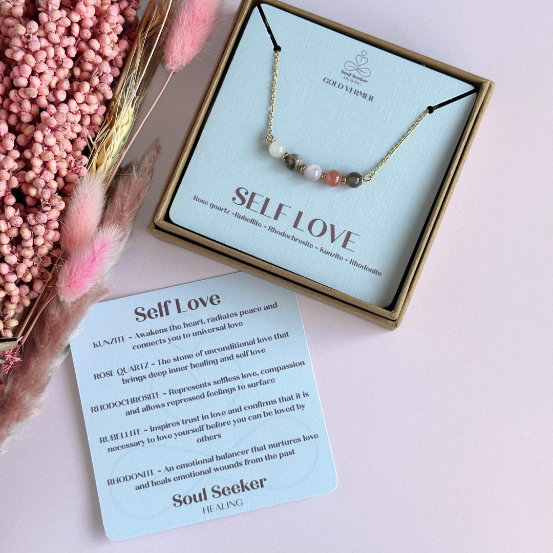 A dainty self love crystal necklace made with a selection of five healing crystals all believed to help promote self love. On a fine, gold vermeil figaro chain, which fastens with a gold vermeil bolt clasp. Featuring corrugated gold vermeil spacer beads and accented with daisy shaped bead caps.