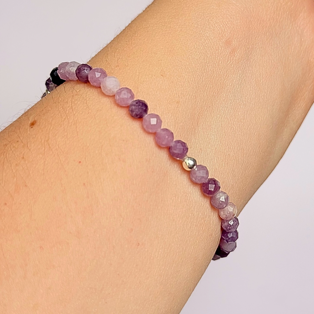 Bracelet featuring 5mm engraved wooden beads which you can personalise with your choice of words, numbers and symbols. The main the band of the bracelet is made with 4mm faceted lepidolite round crystal gemstone beads. Finished with your choice of gold vermeil, sterling silver or rose gold vermeil accent beads.