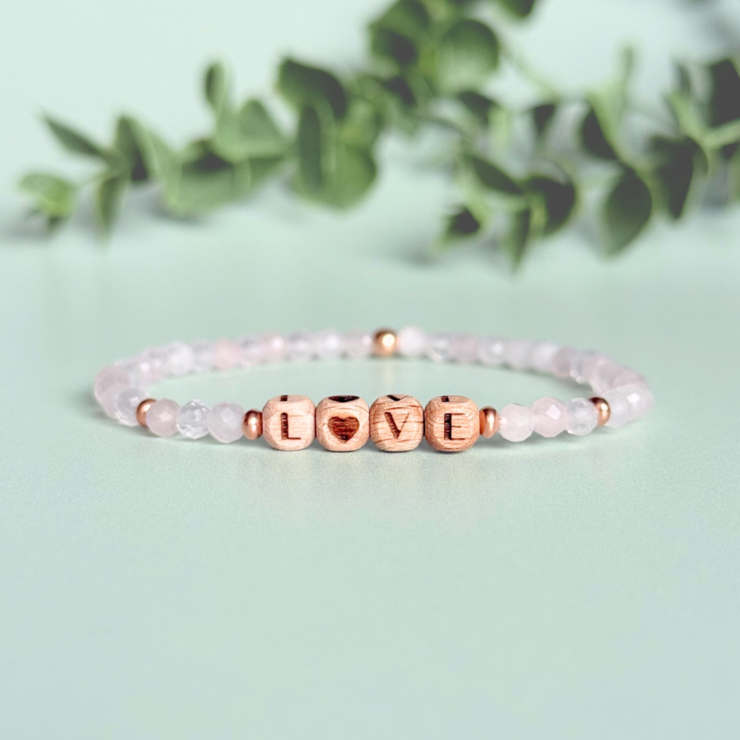 Bracelet featuring 5mm engraved wooden beads which you can personalise with your choice of words, numbers and symbols. The main the band of the bracelet is made with 4mm faceted rose quartz round crystal gemstone beads. Finished with your choice of gold vermeil, sterling silver or rose gold vermeil accent beads.