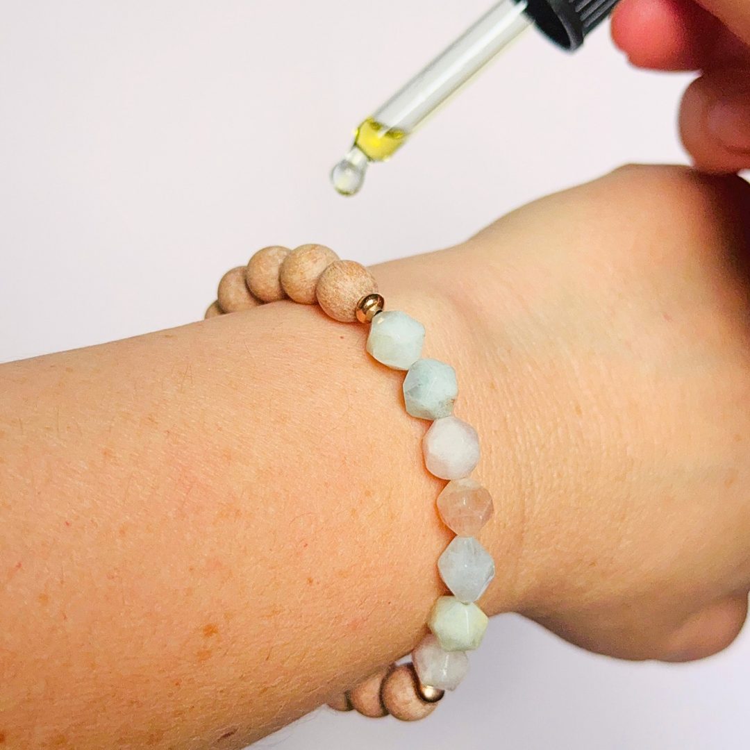 Morganite and raw rosewood elasticated essential oil diffuser bracelet. Made with 8mm star cut morganite beads, 8mm round raw rosewood beads and your choice of sterling silver, gold vermeil or rose gold vermeil spacer beads