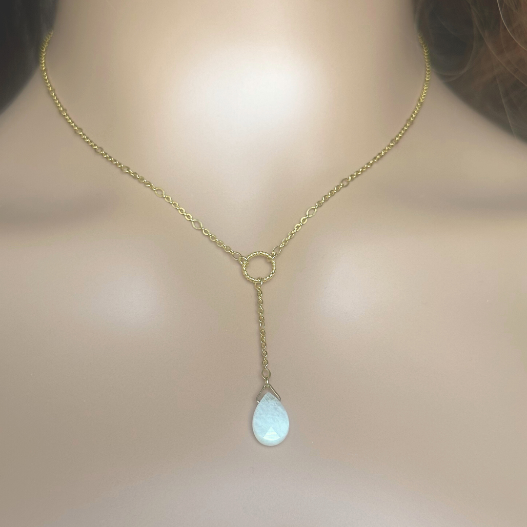 Moonstone necklace features a faceted moonstone teardrop bead on a delicate gold figaro chain with a twisted gold vermeil ring focal point. The necklace fastens with a subtle yet secure gold vermeil bolt clasp. The teardrop bead measures 12mm x 8mm.
