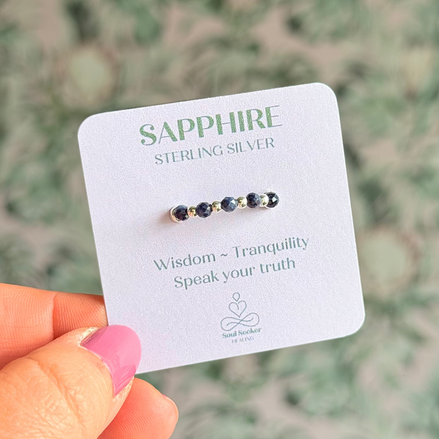Sterling silver and sapphire crystal ring. Made with 2.5 mm sterling silver round beads and featuring five, 3mm faceted genuine sapphire beads in a band style. Perfect for stacking. September birthstone jewellery