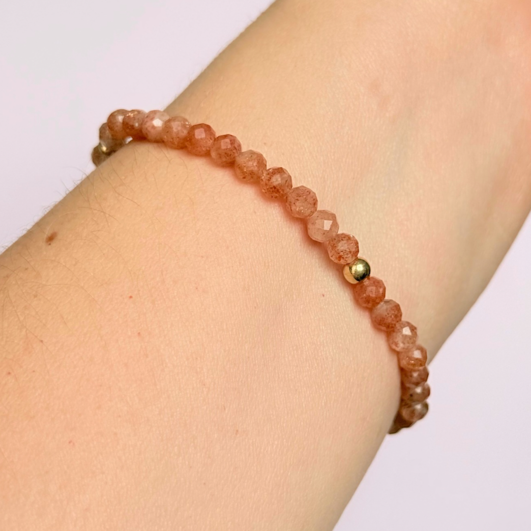 Bracelet featuring 5mm engraved wooden beads which you can personalise with your choice of words, numbers and symbols. The main the band of the bracelet is made with 4mm faceted sunstone round crystal gemstone beads. Finished with your choice of gold vermeil, sterling silver or rose gold vermeil accent beads.