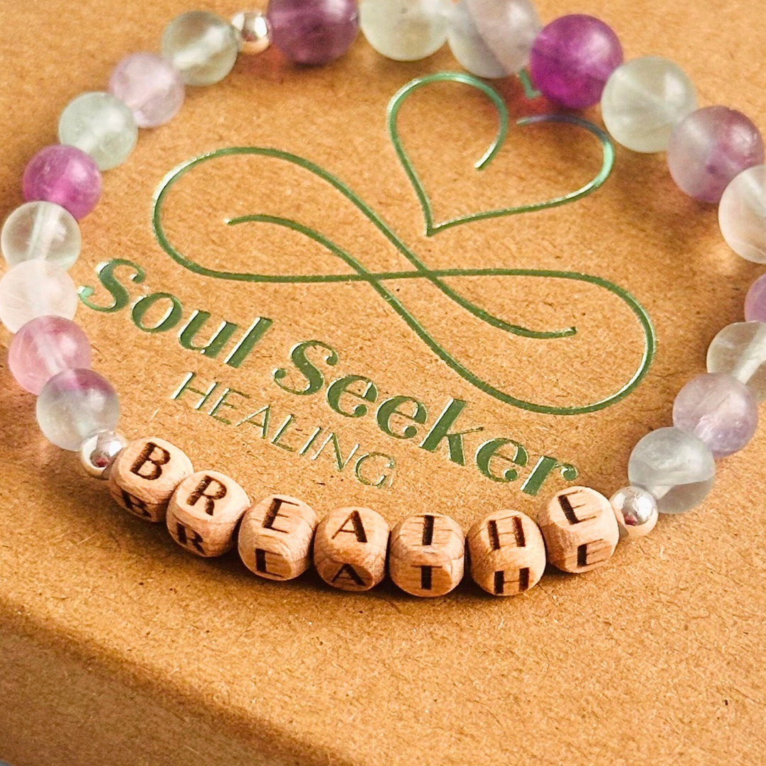 Breathwork bracelet featuring 6mm and 8mm frosted rainbow fluorite crystal beads that follow the 4-7-8 counted breathing method. Also featuring laser engraved wooden letter beads spelling out the word BREATHE. Choose your accent beads from rose gold vermeil, gold vermeil or sterling silver.
