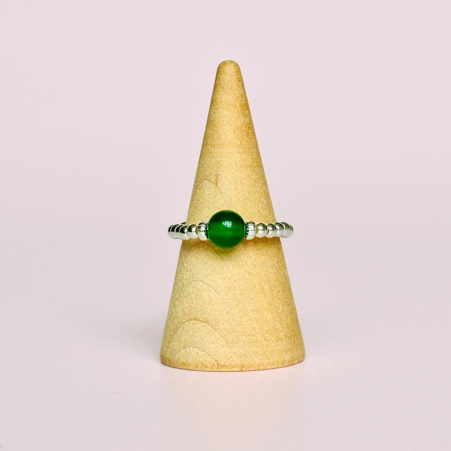 sterling silver green agate ring features a 6mm round ethically sourced green agate bead, surrounded by sterling silver corrugated rondelle beads and delicate 2.5mm sterling silver beads. By Soul Seeker Healing