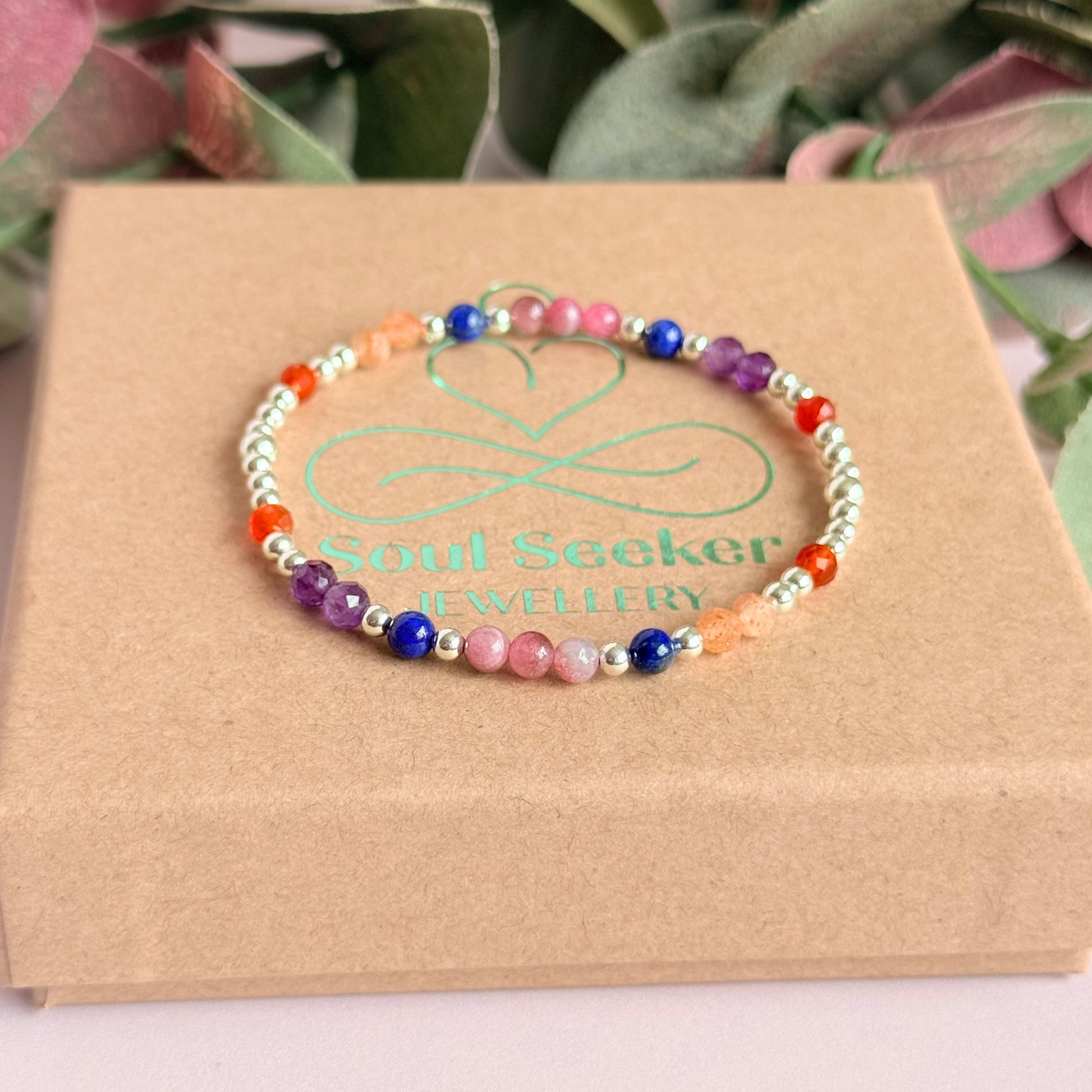 ‘Arabian Sunset' sterling silver dainty beaded bracelet with pink tourmaline, sunstone, carnelian, lapis lazuli and amethyst. Made with round 3mm sterling silver beads and 4mm smooth and faceted round crystal gemstone beads. Pictured on the gift box