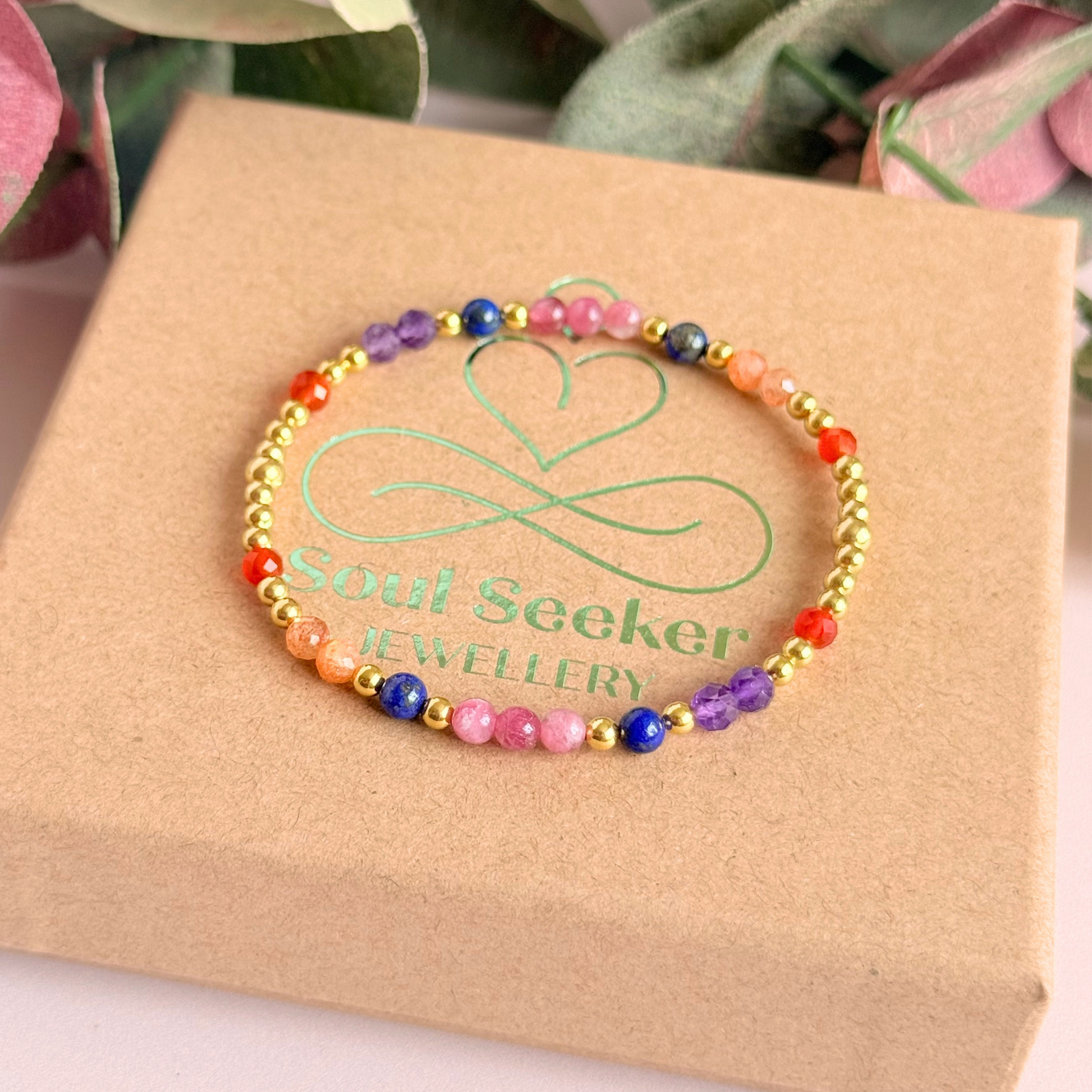 ‘Arabian Sunset' gold vermeil dainty beaded bracelet with pink tourmaline, sunstone, carnelian, lapis lazuli and amethyst. Made with round 3mm gold vermeil beads and 4mm smooth and faceted round crystal gemstone beads. Pictured on the box