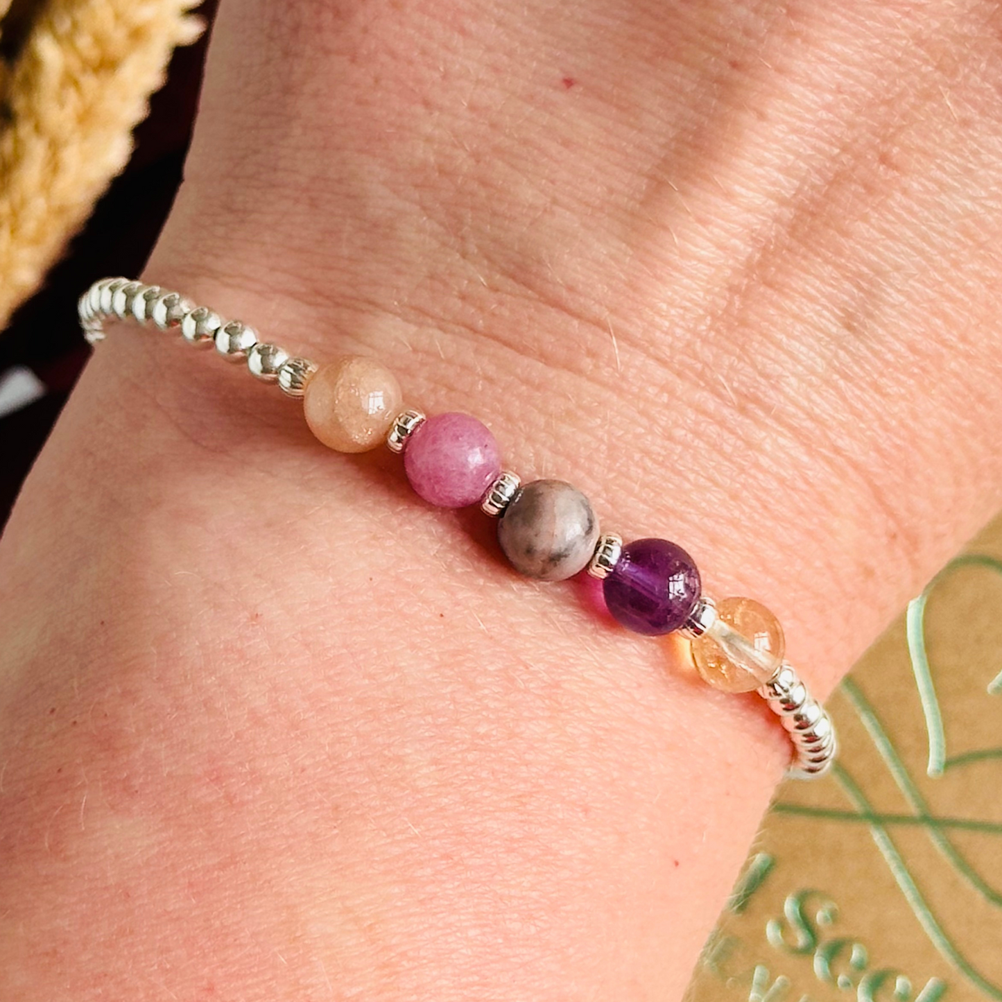 This sterling silver menopause bracelet is made with a selection of five healing crystals all believed to help with the symptoms of menopause. The crystal beads are all 6mm and are on a band of 3mm sterling silver beads with corrugated accent beads.