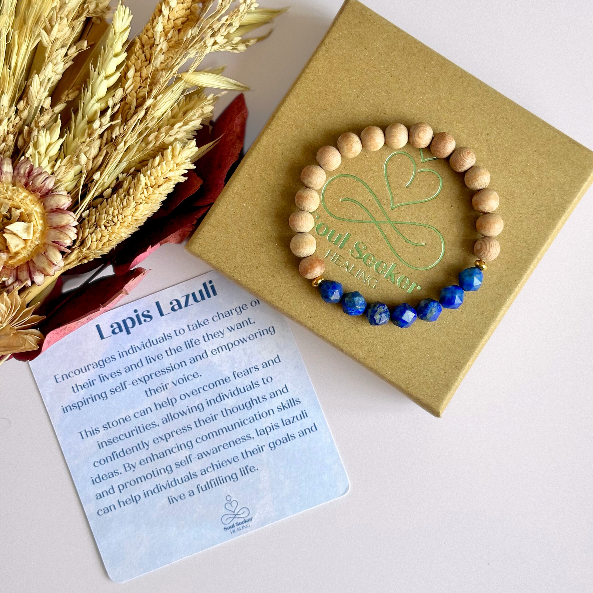 Lapis lazuli and raw rosewood elasticated essential oil diffuser bracelet. Made with 8mm star cut lapis lazuli beads, 8mm round raw rosewood beads and your choice of sterling silver, gold vermeil or rose gold vermeil spacer beads