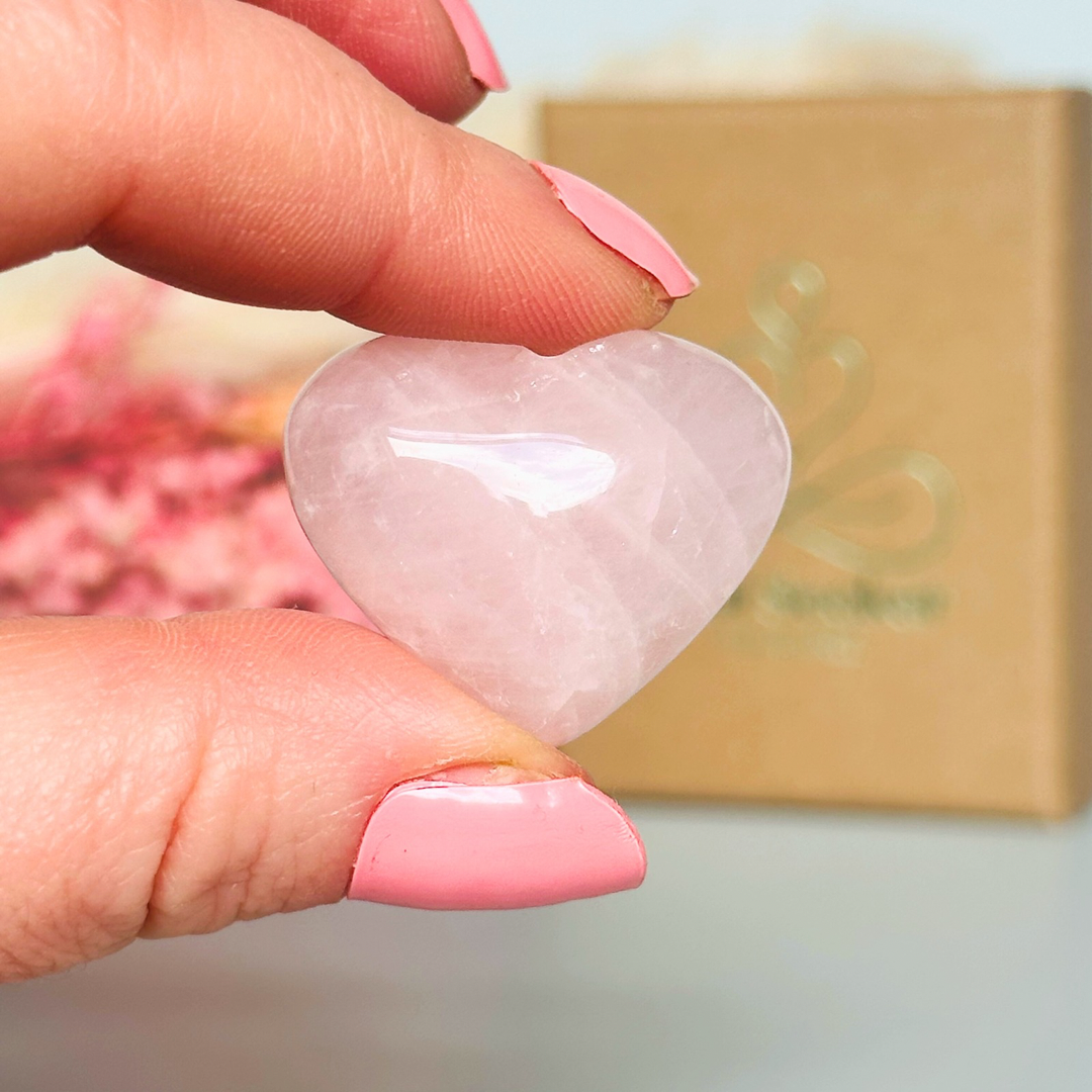 A beautiful, ethically mined rose quartz heart, presented on an eco-friendly textured card with the words ‘Your love is the heartbeat of our family. Happy Mother’s Day.’ This heart shaped rose quartz crystal measures approximately 25mm x 25mm, making it an ideal size to carry with you wherever you go or to display in your sacred space. A cotton bag is included to keep it safe.