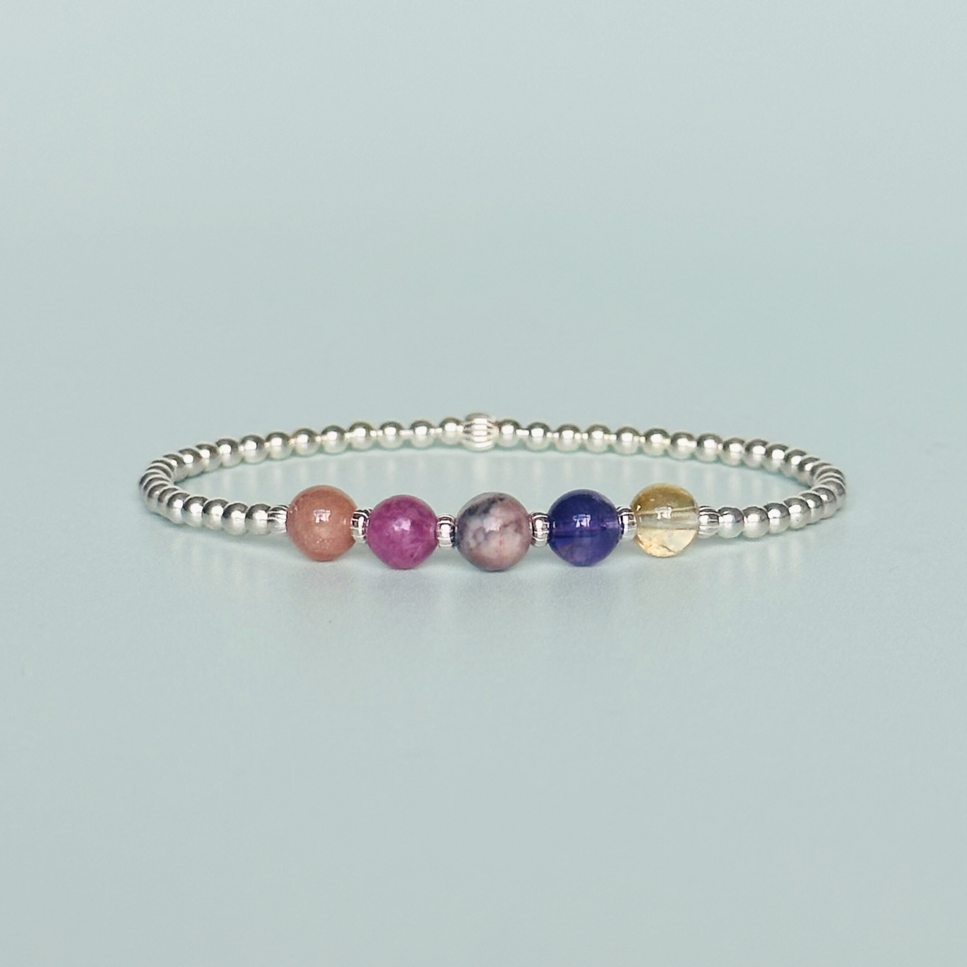 This sterling silver menopause bracelet is made with a selection of five healing crystals all believed to help with the symptoms of menopause. The crystal beads are all 6mm and are on a band of 3mm sterling silver beads with corrugated accent beads.