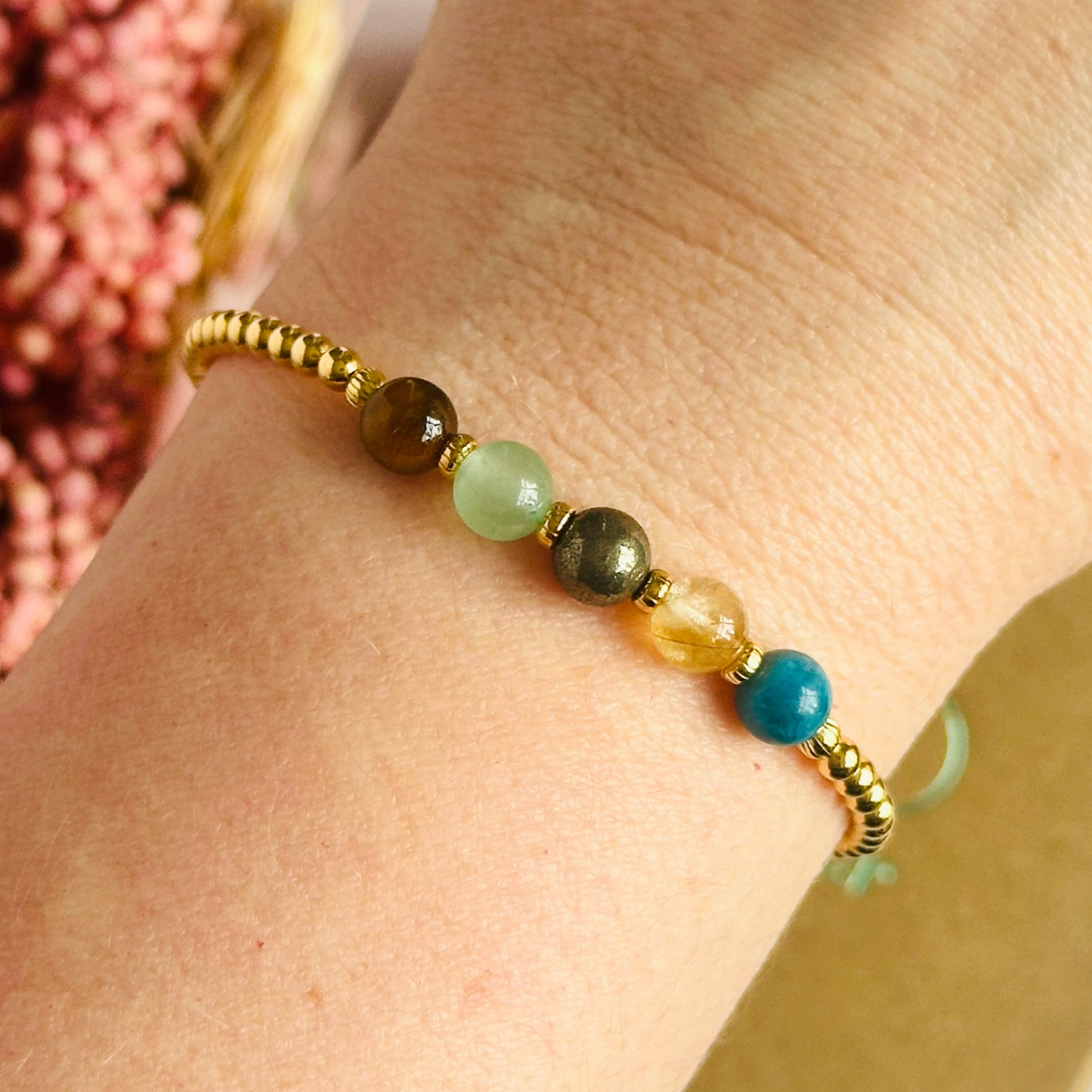 This gold vermeil manifesting bracelet is made with a selection of five healing crystals all believed to help achieve your dream life. The crystal beads are all 6mm and are on a band of 3mm gold vermeil beads with corrugated accent beads.