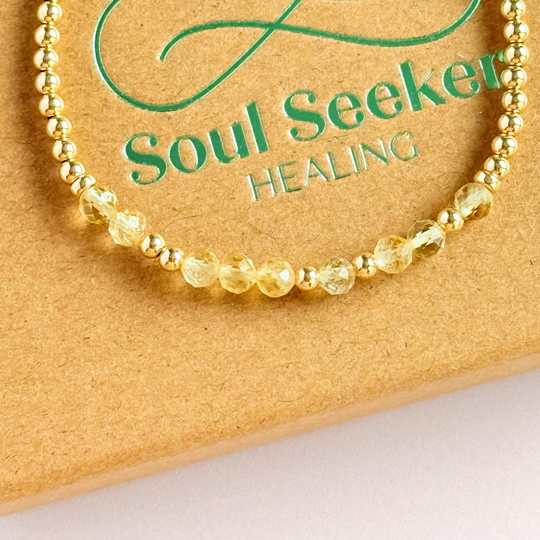 Morse code secret message bracelet spelling out your chosen name in gold filled and citrine crystal beads. Elasticated with 4mm faceted citrine beads and 3mm gold filled beads. Custom November birthstone bracelet.