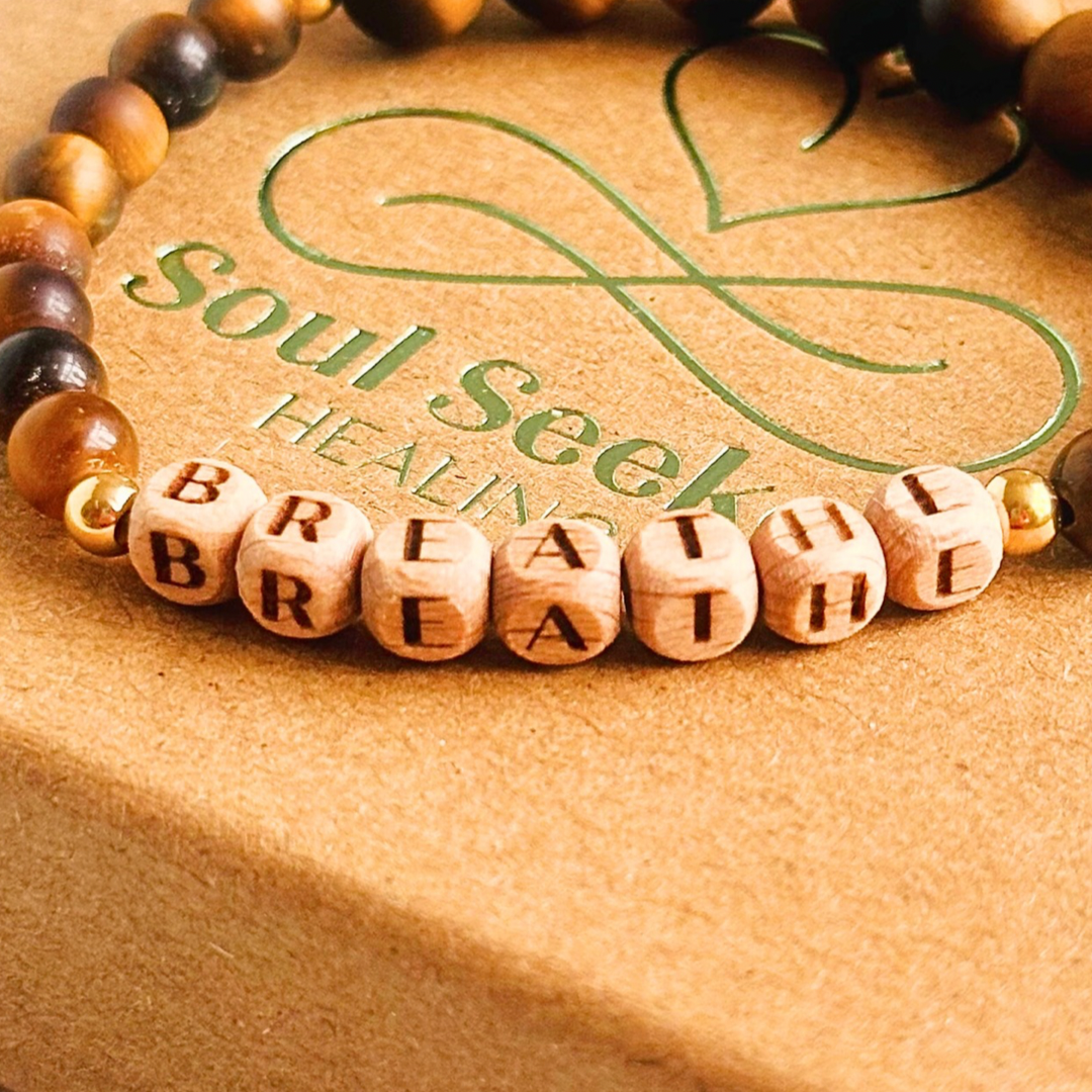 Breathwork bracelet featuring 6mm and 8mm frosted tigers eye crystal beads that follow the 4-7-8 counted breathing method. Also featuring laser engraved wooden letter beads spelling out the word BREATHE. Choose your accent beads from rose gold vermeil, gold vermeil or sterling silver.