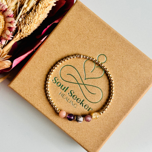 This gold vermeil menopause bracelet is made with a selection of five healing crystals all believed to help deal with menopause symptoms. The crystal beads are all 6mm and are on a band of 3mm gold vermeil beads with corrugated accent beads.