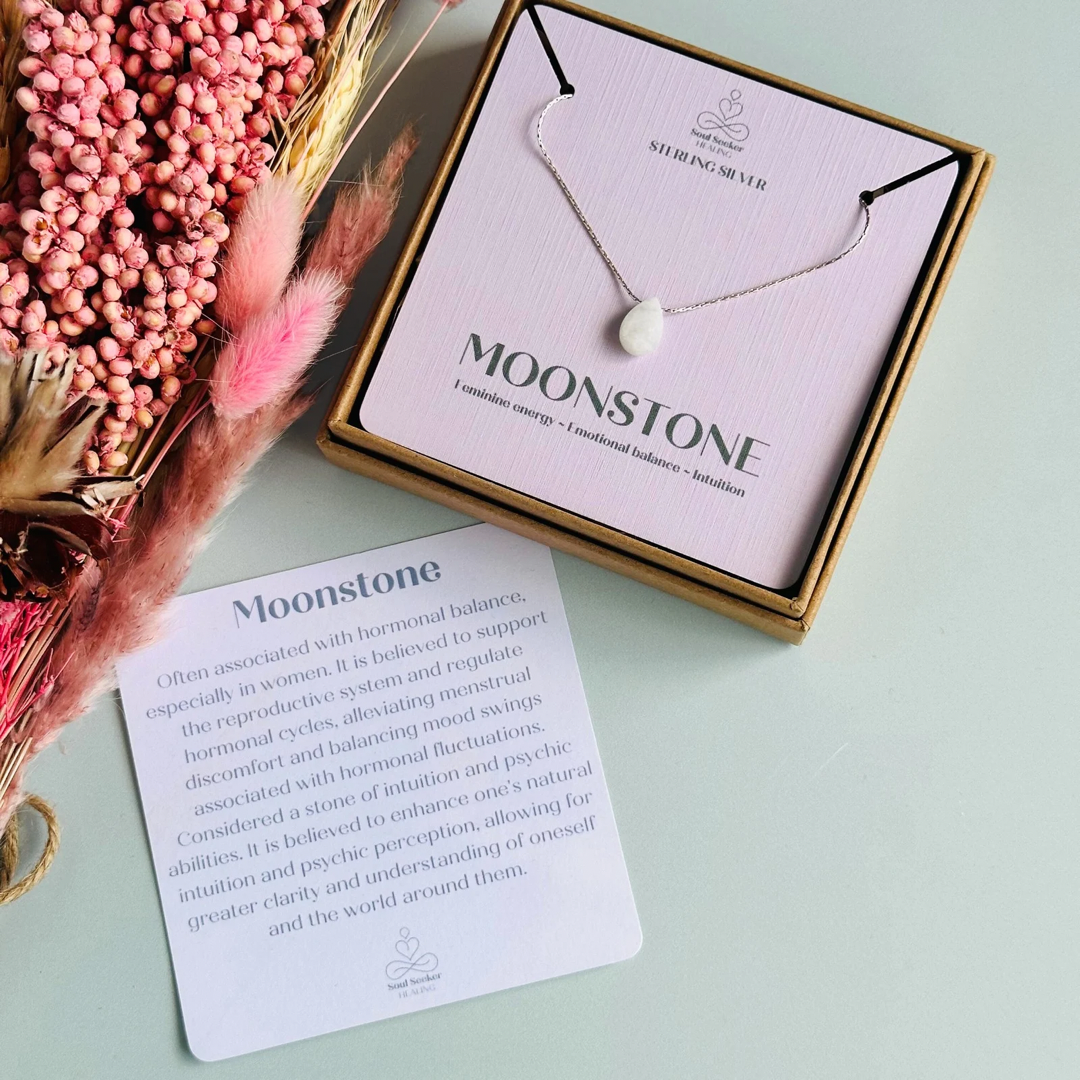 Dainty moonstone teardrop necklace featuring a 12x8mm faceted moonstone teardrop bead on a fine sterling silver cardano beading chain.