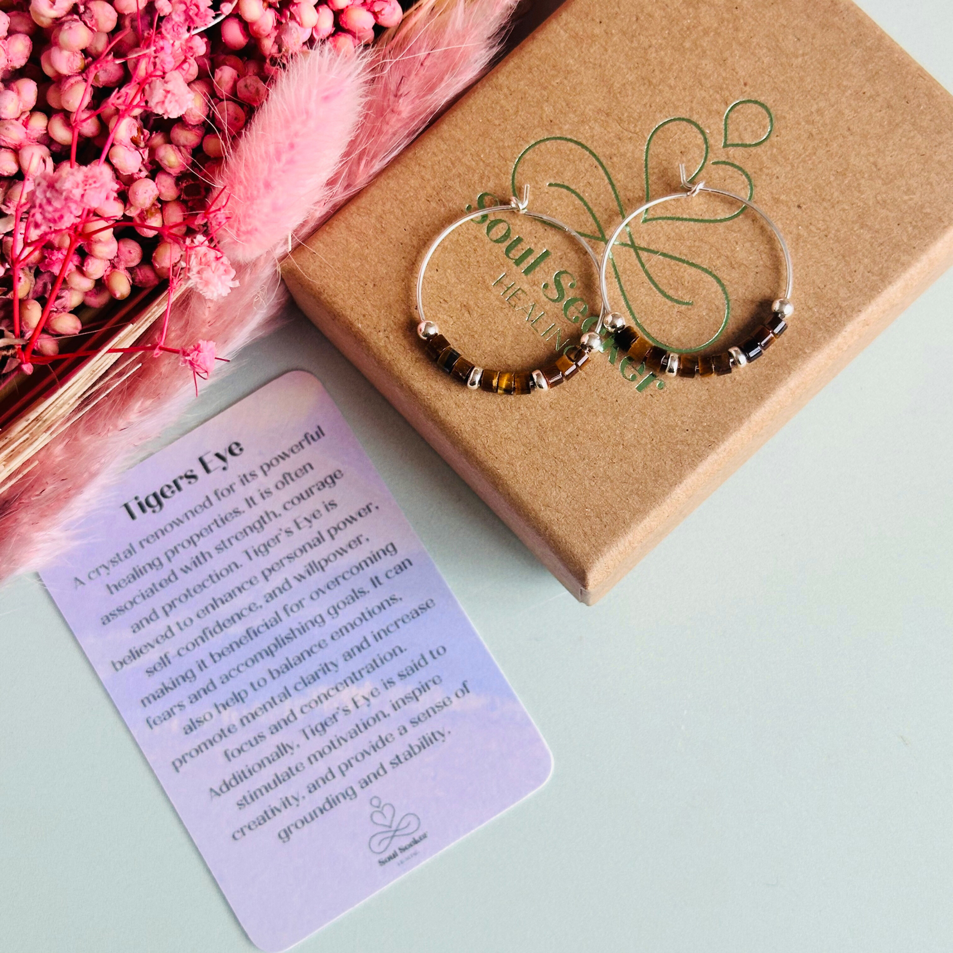 Tigers eye sterling silver hoop earrings with ethically mined tigers eye heishi beads on 25mm sterling silver hoops.