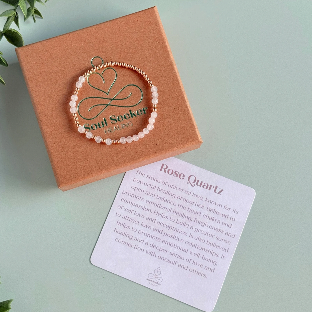 Morse code secret message bracelet spelling out the words Mum est. 2025 in gold filled and rose quartz crystal beads. elasticated with 4mm rose quartz beads and 3mm gold filled beads.
