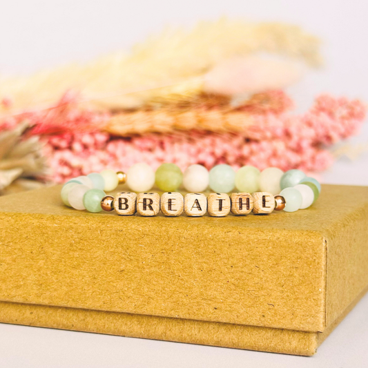 Breathwork bracelet featuring 6mm and 8mm frosted crystal beads that follow the 4-7-8 counted breathing method. Also featuring laser engraved wooden letter beads spelling out the word BREATHE. Choose your accent beads from rose gold vermeil, gold vermeil or sterling silver.