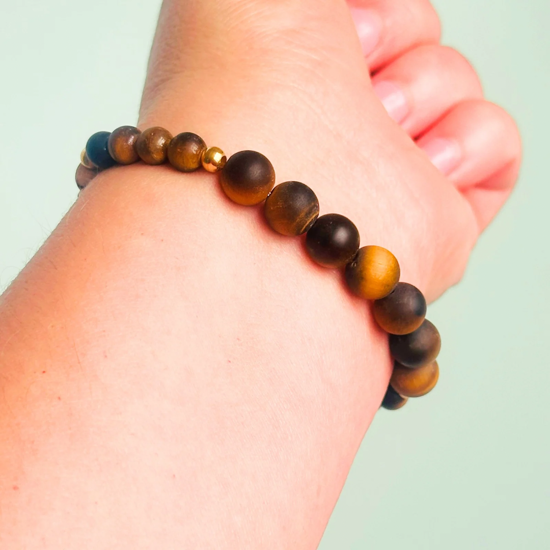 Breathwork bracelet featuring 6mm and 8mm frosted tigers eye crystal beads that follow the 4-7-8 counted breathing method. Also featuring laser engraved wooden letter beads spelling out the word BREATHE. Choose your accent beads from rose gold vermeil, gold vermeil or sterling silver.
