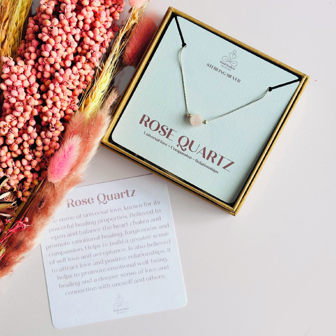 Rose quartz necklace featuring an 8mm star cut rose quartz bead with corrugated sterling silver beads on a delicate sterling silver cardano beading chain. The necklace fastens with a subtle yet secure sterling silver bolt clasp.