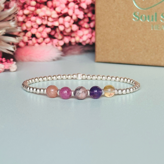 This sterling silver menopause bracelet is made with a selection of five healing crystals all believed to help with the symptoms of menopause. The crystal beads are all 6mm and are on a band of 3mm sterling silver beads with corrugated accent beads.