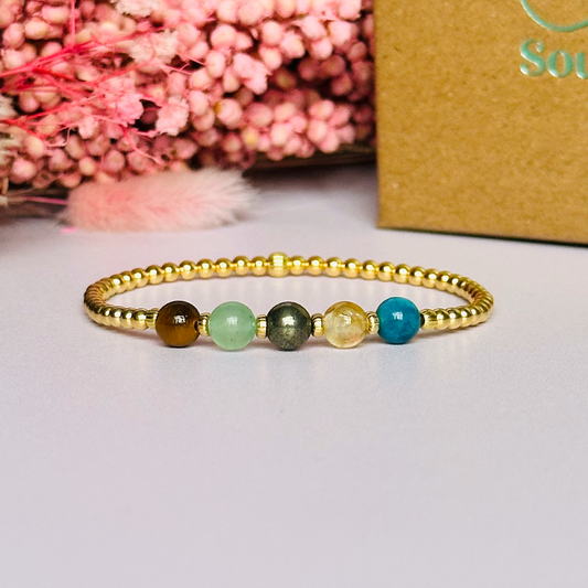 This gold vermeil manifesting bracelet is made with a selection of five healing crystals all believed to help achieve your dream life. The crystal beads are all 6mm and are on a band of 3mm gold vermeil beads with corrugated accent beads.