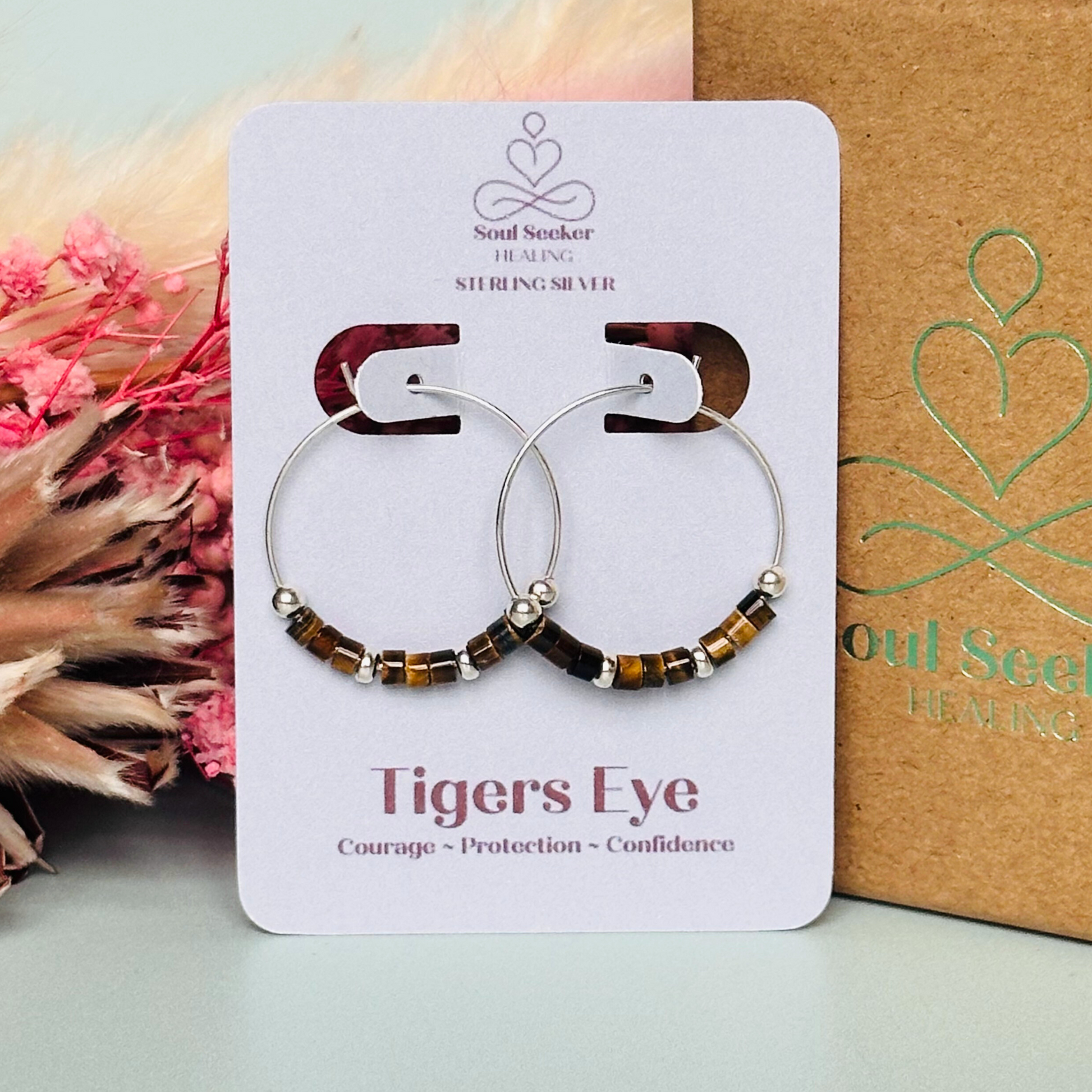 Tigers eye sterling silver hoop earrings with ethically mined tigers eye heishi beads on 25mm sterling silver hoops.
