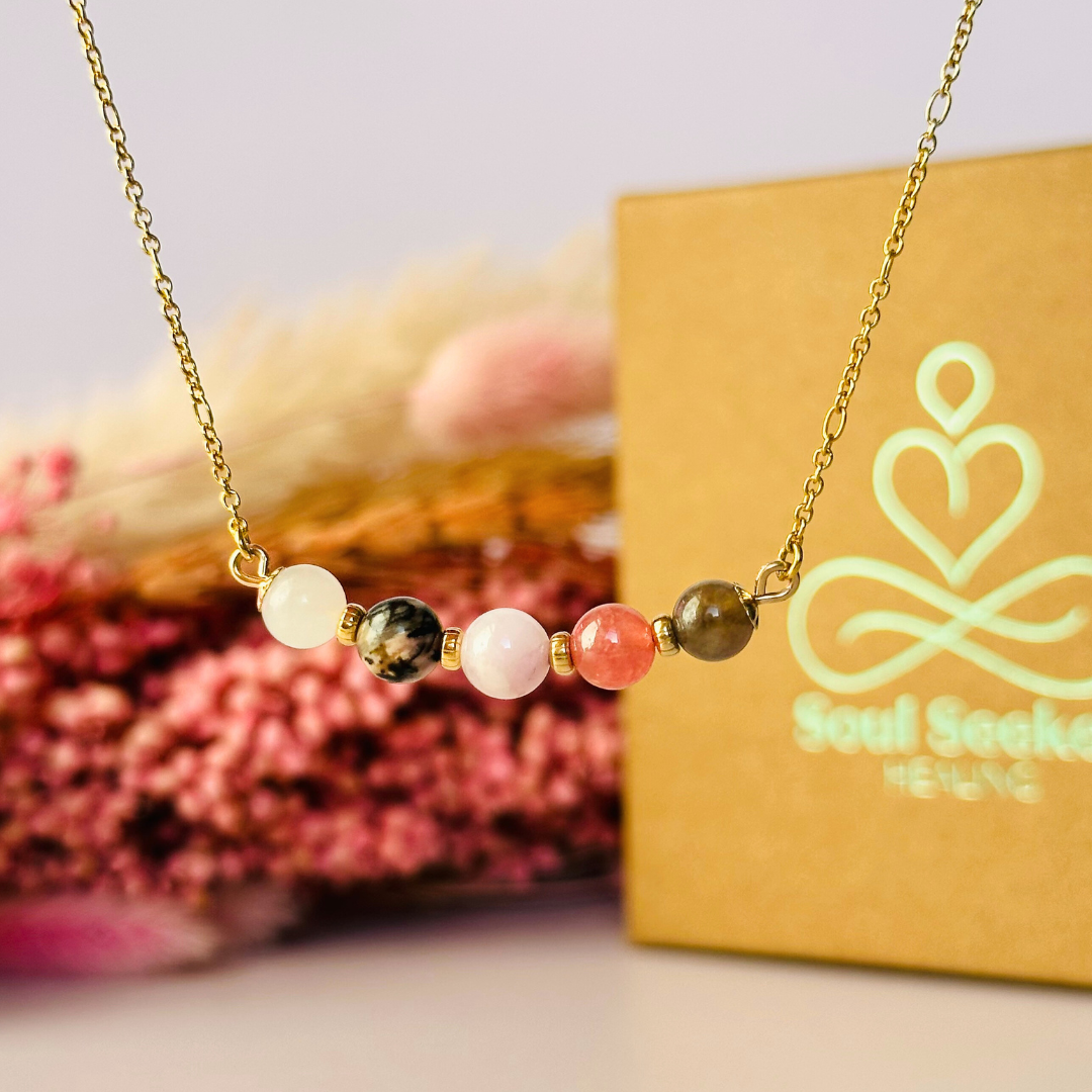 A dainty self love crystal necklace made with a selection of five healing crystals all believed to help promote self love. On a fine, gold vermeil figaro chain, which fastens with a gold vermeil bolt clasp. Featuring corrugated gold vermeil spacer beads and accented with daisy shaped bead caps.