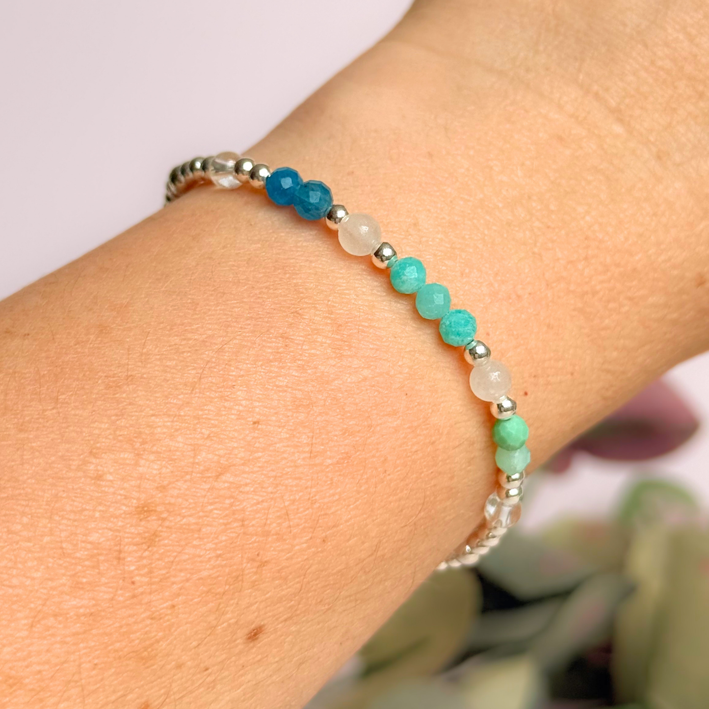 ‘Caribbean Dream' sterling silver dainty beaded bracelet with white jade, chrysoprase, amazonite, apatite and clear quartz. Made with round 3mm sterling silver beads and 4mm smooth and faceted round crystal gemstone beads. Pictured being worn