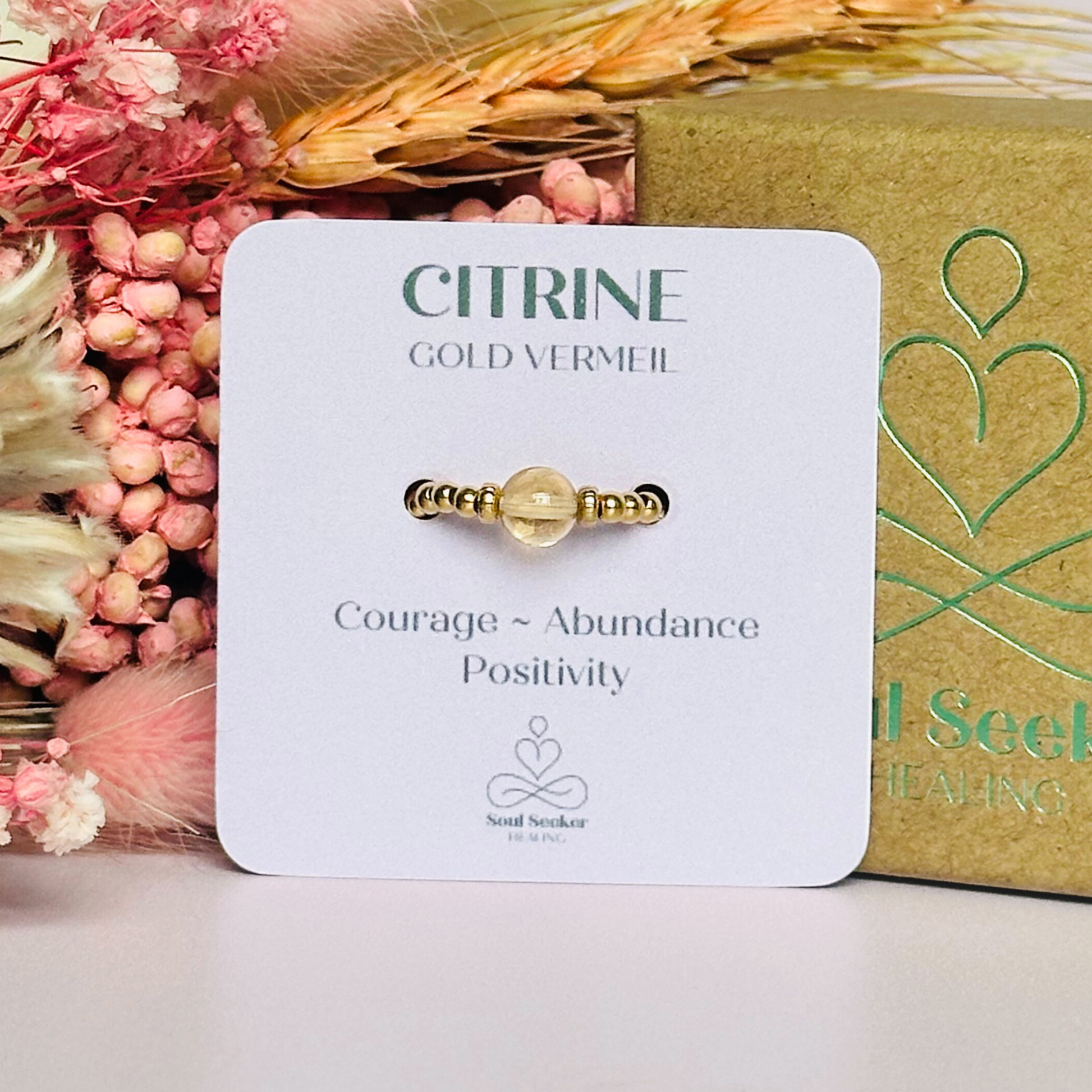 Citrine ring featuring a 6mm round citrine bead, flanked by gold vermeil rondelle beads on a gold vermeil elasticated band. November birthday ideas, November birthday gift, November birthstone ring, stretch ring, November jewellery, born in November