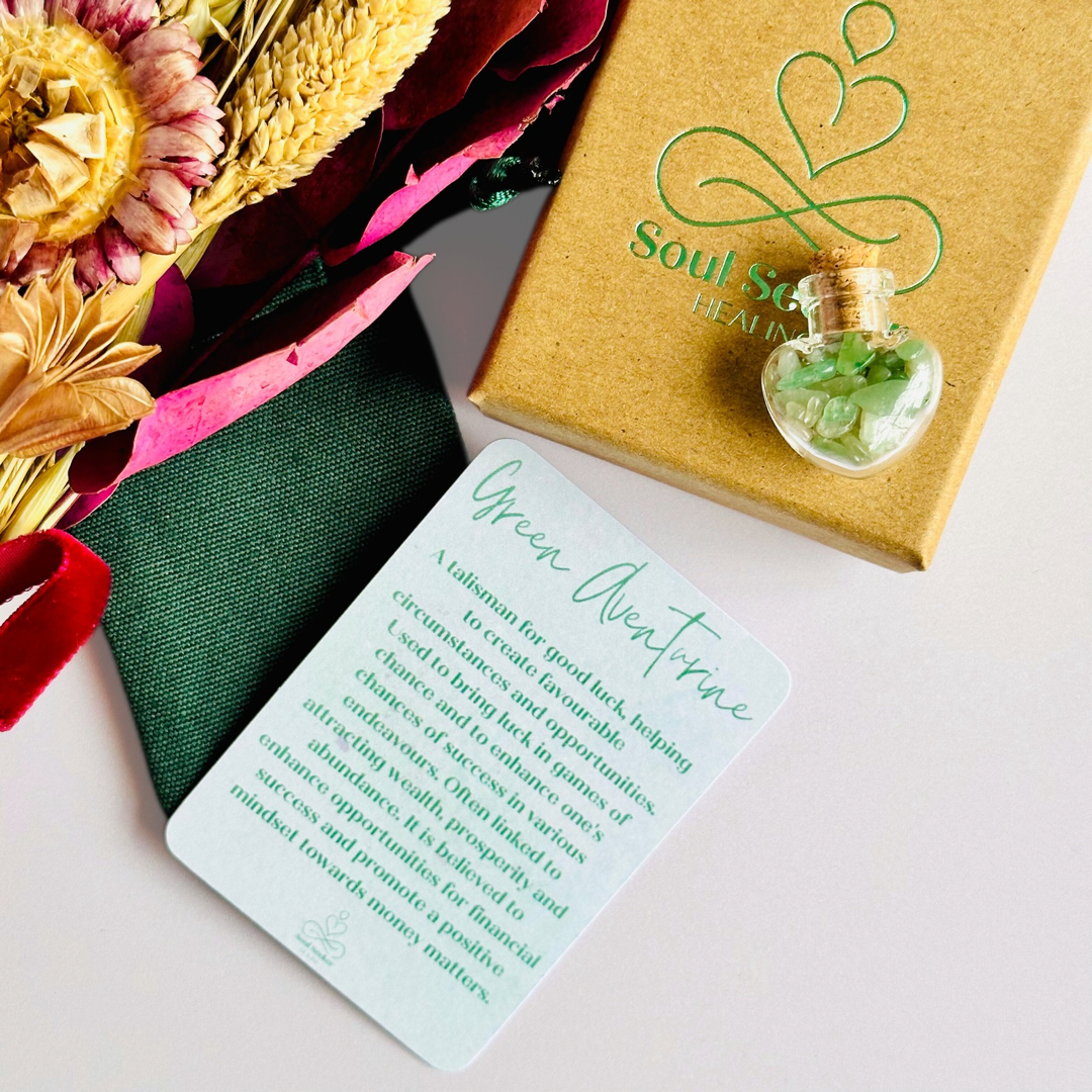 A pretty heart shaped mini glass bottle filled with powerful, ethically mined green aventurine crystal chips, known for their properties regarding good luck, abundance and success. Presented on a card with the words ‘may good luck be your constant companion.’ This bottle measures approximately 28mm x 23mm, including cork when it is pushed in.